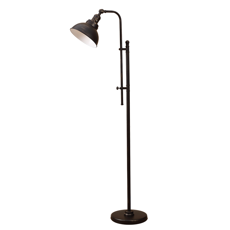 Zwart en goudkleurige vloerlamp